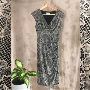 Beautiful lace print faux wrap dress!